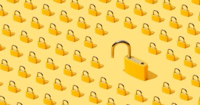 High-angle view of yellow padlocks on yellow background. One of them is open.