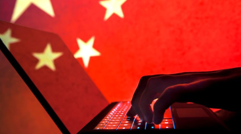 Cybercriminal, hacker China flag background.