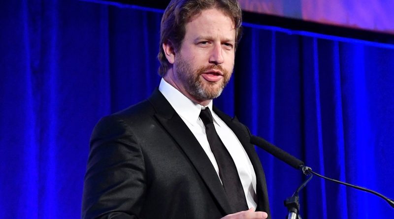 Joe Sanberg speaks at an event.