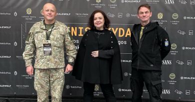Coinvest Capital managing partner Viktorija Trimbel with Lieutenant Colonel Linas Idzelis (in uniform) and Lieutenant Colonel (retired) Valerijus Šerelis at the 'Fire Shield' hackathon