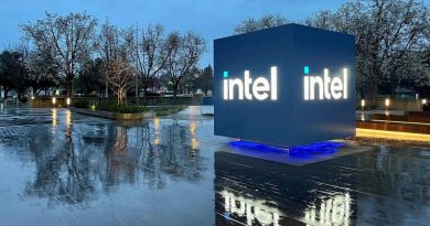 Intel Headquarters Robert Noyce Building in Santa Clara, California at night with Intel sign lit up.