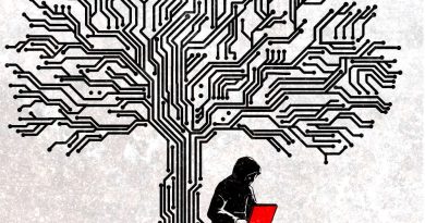 A tree made of circuits. Person sitting at base with laptop.