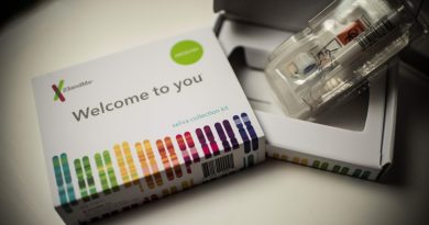This illustration picture shows a saliva collection kit for DNA testing displayed in Washington DC