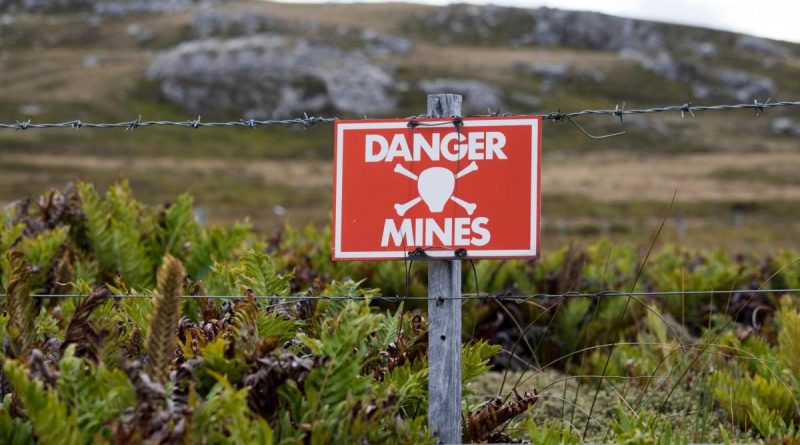 A sign warns people of landmines.