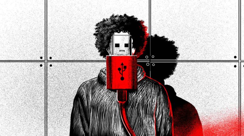 A man hiding behind a USB cable.